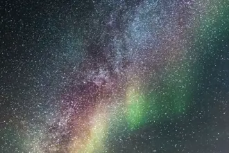 Colorful Aurora Borealis under a Starry Sky in Iceland.