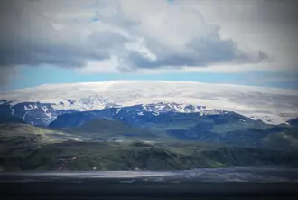 View of Katla volcano covered in snow in Iceland.