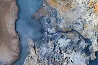 Aerial view of a mud pool at Seltun geothermal area at Reykjanes close to Keflavik Airport Iceland.