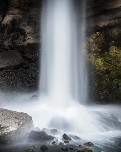 Kvernufoss waterfall in southern Iceland, known for its secluded and scenic location.