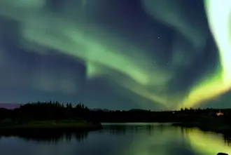 Ellidavatn with Northern Ligths dancing above in Reykjavik.