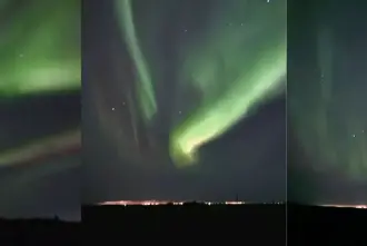 Northern Lights Over Raudavatn Lake in Reykjavik Iceland.