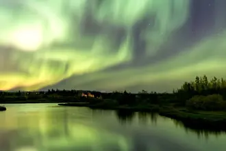 Northern Lights Over Ellidavatn In Reykjavik.