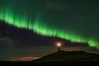 Northern Lights In Iceland Over Lighthouse Large