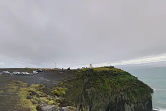 Háey lighthouse parking at Dyrholaey in Iceland.