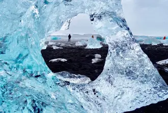 People Clear Iceberg Hole Diamond Beach Black Sand Beach Iceland.