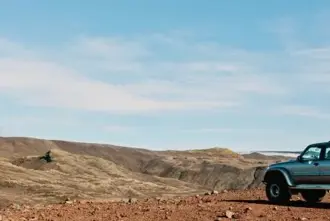 Truck parked overlooking a highland area in south Iceland on a Self Drive tour.
