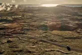 Aerial view of road from Keflavik Airport to Reykjavik on Reykjanes peninsula with lava fields.