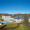 Aerial view of the grounds and outside pool of Hótel Örk.