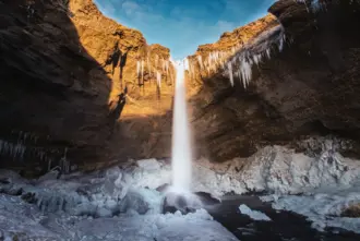 Kvernufoss Walk Behind Waterfall In Winter Medium1600x1067