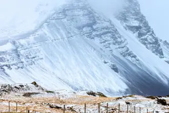 Hofn mountain covered in snow in winter.